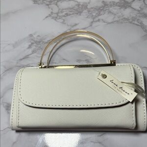 Stylish White and Black Clutch with Gold Accents